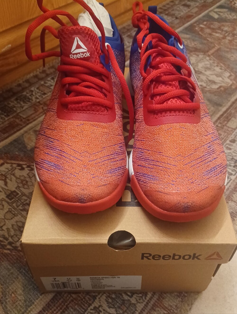 Reebok Orange-Red Knit Trainers with Purple Detailing